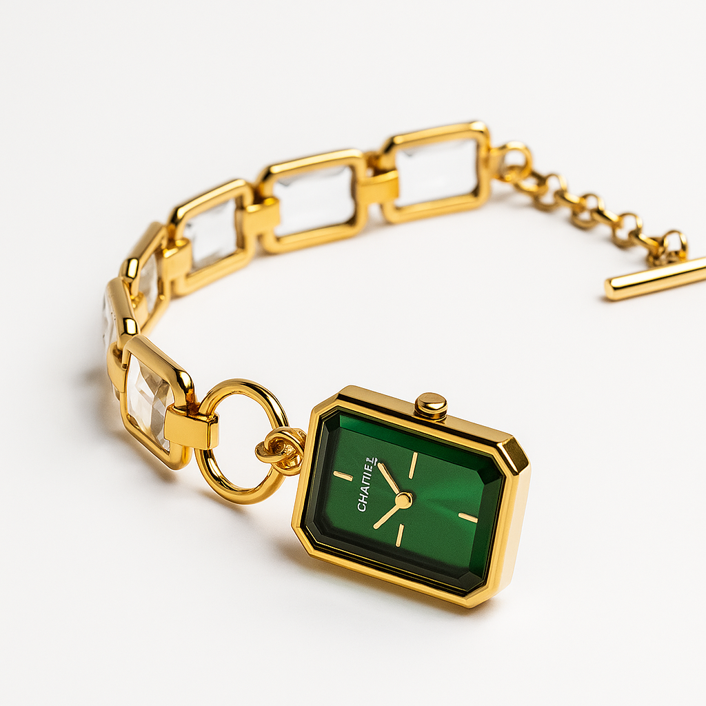 Gold watch with a green face on a white background